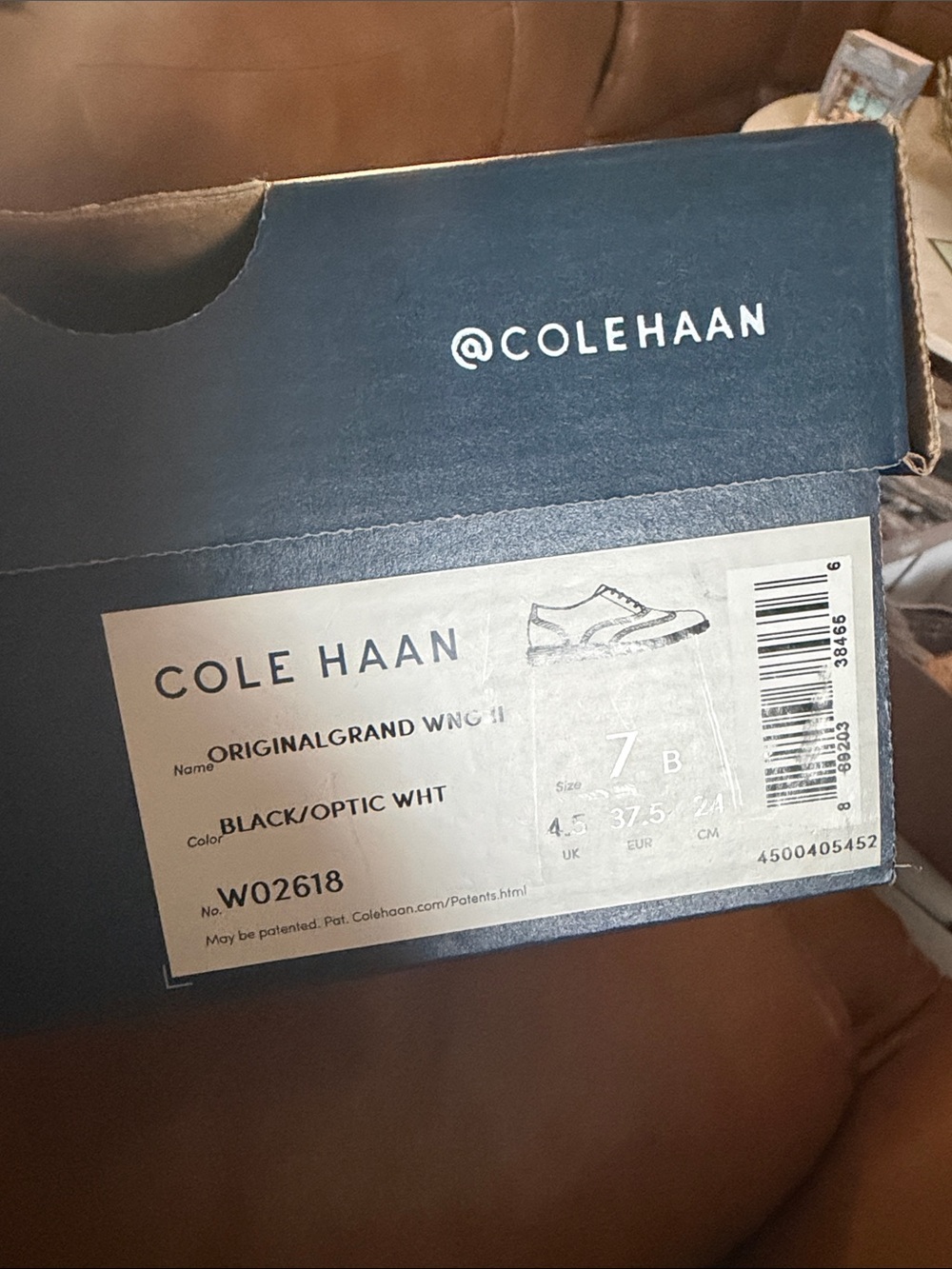 Cole Haan Black Leather Wingtip Sneakers
